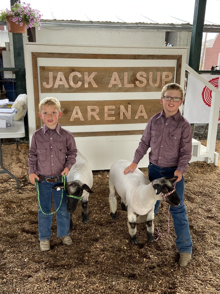 Hudson and Rhett pose with their lambs